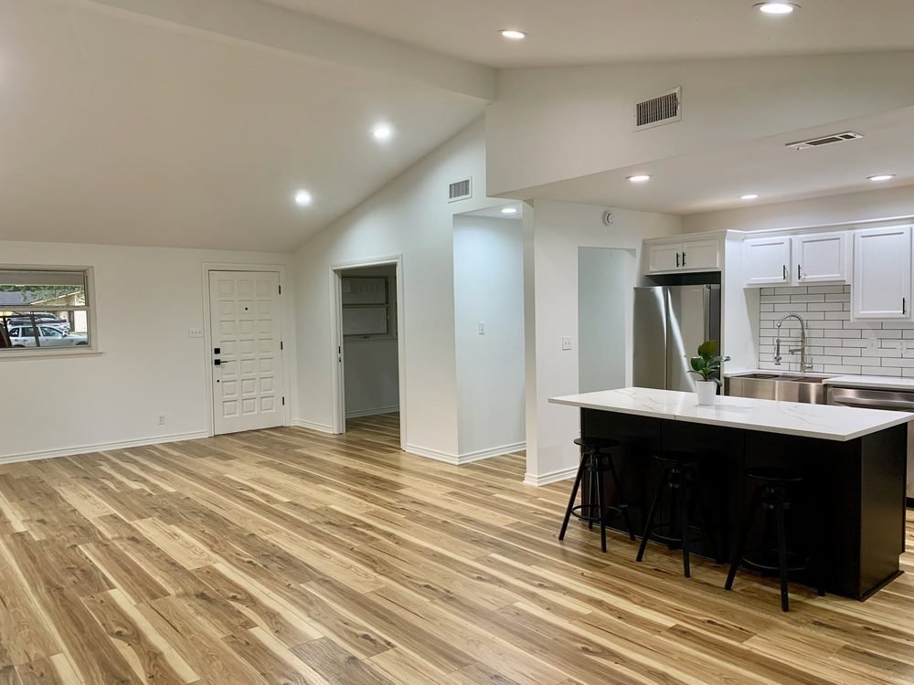 Open kitchen with island and hardwood floors